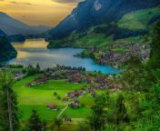 the charming mountain village of wengen switzerland is home to cozy timber houses and chalets where you can stay before trying out activities like paragliding river rafting or hiking along the areas stunning valleys and meadows.jpg from small village