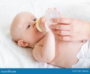 baby infant eating milk bottle 37511249.jpg from milk eating