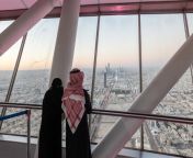 visitors looks out towards the city skyline from the skybridge of the kingdom center in riyadh saudi arabia on thursday jan 19 2023 mostly shut off to foreign visitors for years crown prince and de facto ruler mohammed bin salman has unveiled an ambitious push to use tourism as a way to help diversify the oil dependent economy.jpg from saudi arabi arabi saudi arab bf video saudi arab bf video saudi arabi arabi