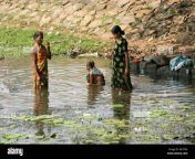 women bathing at bolgarh village orissa india aa77em.jpg from indian village bathing