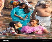 indian hindu pilgrims bathing in the ganges river at dashashwamedh c8dytj.jpg from indin vilage bath in door