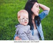 stock photo beautiful young asian mom with freckles and son relaxing outdoors mother brunette with dark hair 331731839.jpg from asian mom and son porneacher kidnap sex mass
