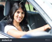 stock photo young indian woman driving a car 79555165.jpg from indian in car