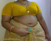 south indian aunty saree navel 600x594.jpg from saree fat aunty sex
