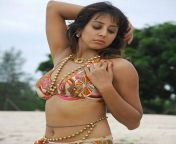actress sanjana hot and spicy photo stills from mugguru movie 1.jpg from sania pandit