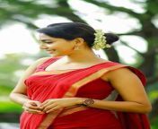 aishwarya lakshmi latest stills in red saree and sleeveless blouse7.jpg from aishwarya lakshmi xxxess casual sex bathroom leaked mmsta