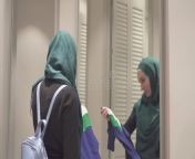 young pretty muslim woman hijab backpack her back tries clothes front mirror dressing room 130236288.jpg from muslim babe in hijab mp4