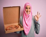 young beautiful arab woman wearing pink muslim hijab holding delivery box italian pizza doing ok sign fingers excellent 228259019.jpg from www arab delivery all video download 3gp com