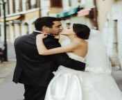 gorgeous beautiful exotic brunette bride handsome groom kiss kissing closeup 66025204.jpg from exotic kiss