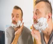 guy shaving his beard bathroom man applying shaving foam cream his face standing bathroom looking mirror preparing to 130719126.jpg from 12yrgirl nudeelugu girls bathroom athulu shaving سکس لوکل ویڈیوgla sex wap com house wife and