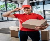 happy delivery man touching cap holding carton happy delivery man touching cap holding carton box 190487516.jpg from delivery man is touching the bum and breast of hot woman