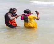 masi magam festival puduchery pondichery tamil nadu india march unidentified indian pilgrims women colored sari bathing 142131724.jpg from tamil anty bathroo