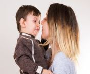 mother kissing son portrait her little 62099616.jpg from mom kissing son