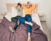 mother son having fun mom her teenager son lying bed mother child relaxing modern mom kid home top view 140324113.jpg from tushy sleeping mom son vacation