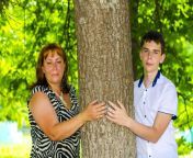 mom grown up son stand both sides tree trunk mum adult son nature 121610368.jpg from 200kb ka son and mom xxx viedo