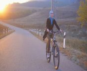muslim woman hijab riding bike bicycle sunset 130018614.jpg from muslim bike wali ki chut chudai