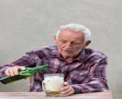 old man drinking beer elderly drunk sitting table 135492048.jpg from 88 old man drinking breast milkta