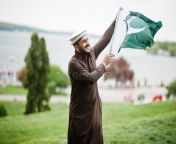 pakistani pathan man wear traditional clothes hold pakistan flag pakistani pathan man wear traditional clothes hold pakistan flag 211583893.jpg from pakistani pathan outdoor