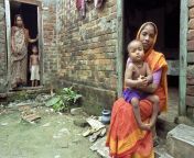 portrait mother child poverty environment bangladesh capital city dhaka group family full length red carpet 79154664.jpg from bangladeshi village mother son