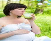 pregnant happy woman drinking milk mom expecting baby belly pregnancy beautiful maternity concept 80989300.jpg from milk mom