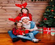 smiling father santa hat daughter hugging holding gift box near christmas tree home merry christmas smiling 134412035.jpg from father sata daughter xxxxxxx