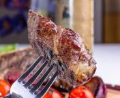 slice steak impaled fork background plate meat slice steak impaled fork background 195755286.jpg from meat impaled