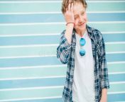 fashion portrait caucasian blue eyed blonde hair year old teenager boy dressed t shirt checkered sunglasses cramped 174492682.jpg from 12 old blonde tee