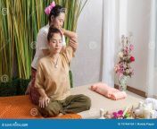 thai masseuse doing massage woman spa salon asian beautiful getting women herbal compress very relaxed healthy 197464169.jpg from beautiful massage room fuck massage man