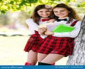 two pretty schoolgirls school uniform stand books outdoors park 143487432.jpg from cute and beautiful school fuckedv serial indian actress semar xxx naked