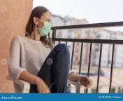woman wearing mask quarantine surgical outdoors as part coronavirus protection prevention protocols home isolation 178459403.jpg from wear mask quarantine