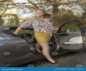 woman driver getting out vehicle attractive female luxury car wearing floral shirt short skirt 132766411.jpg from view full screendian woman getting fucked