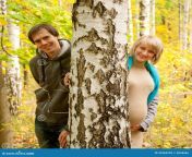 young couple love autumn forest near birch 32364252.jpg from cople in forest