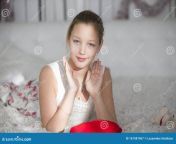 very beautiful teen girl lying bed red heart pillow young lady very beautiful teen girl lying bed 167581967.jpg from veryteen