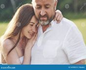 handsome old men beautiful young girl hugging daughter her dad spend time together outdoors man 164789515.jpg from old men and cute gir
