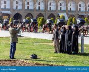 man photographing afghan family phone husband his three wives naghsh e jahan square also known as imam isfahan iran 186362649.jpg from afghani husbaind