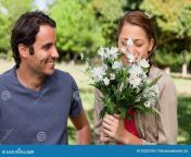 man watching his friend smell bunch flowers 25332108.jpg from he watches his friend and his