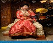 magnificent young indian bride luxurious dress precious jewellery sitting chair luxury apartment classic vintage 202887747.jpg from hot sexy indian desi dulhan