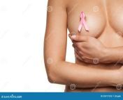 naked woman wearing pink breast cancer ribbon attached to her bare nipple as cups her her hand graceful 35311933.jpg from bare nipp