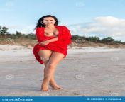 naked woman beach red fabric young 35906001.jpg from beach naked women