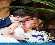 newlywed couple kissing enjoy their wedding day united states 31254043.jpg from newly wed couple kissing