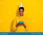 photo cute cheerful trans male celebrate birthday enjoy yummy slice cake make wish isolated yellow color photo cute 258360152.jpg from yummy trans