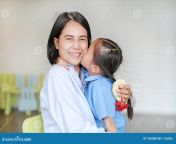 portrait asian little girl kissing her happy mom hugging mother s day thailand kid pay respect give thai traditional 156588100.jpg from thailand mom
