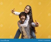 romantic indian couple having fun together showing v sign gesture happy millennial guy piggybacking his girlfriend joyful lady 239103117.jpg from desi lovers having fun in public place full