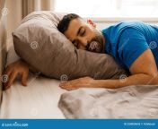 sleeping young arab sleeping resting peacefully comfortable bed gray linens closed eyes free space sleeping young 259059643.jpg from sleeping seç