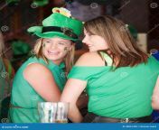 st patricks day girls candid portrait two attractive sitting irish pub saint dressed green to celebrate 38851420.jpg from candid hd st patricks day sauna