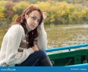 beautiful woman out boating young sitting rowboat lake river autumn looking pensively camera close up 34225471.jpg from vintage male nude boating jpg
