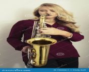 blond teen saxophone girl playing 75269611.jpg from dasi sax video hd