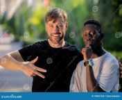 black guy white hug stare interracial friendship 188461406.jpg from black white guy