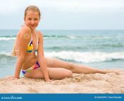 маленькая девочка красотки на пляже 26266398.jpg from Минет и дрочка от худенькой красотки