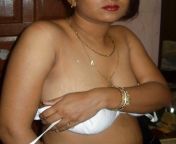 351 1000.jpg from indian bhabhi striping her sariig anty deras boob